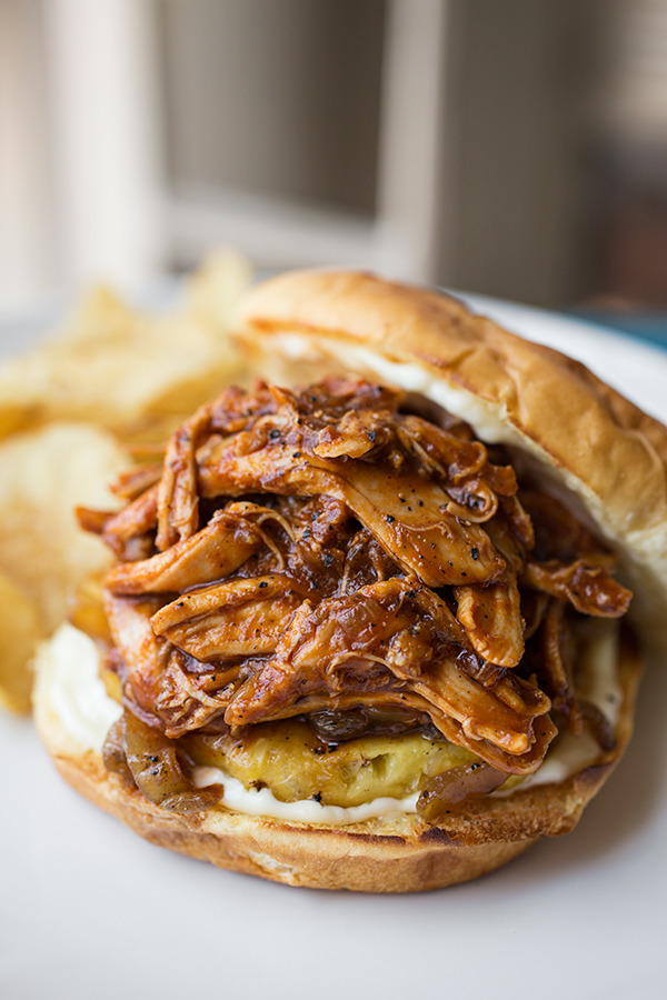 Smoky Hawaiian-BBQ Pulled Chicken Sandwiches on Toasted Hawaiian Buns, with Grilled Pineapple and Maui Onions