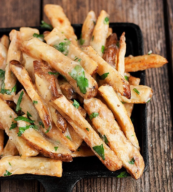 Oven-baked fries with gravy, cheddar, parmesan and fresh herbs