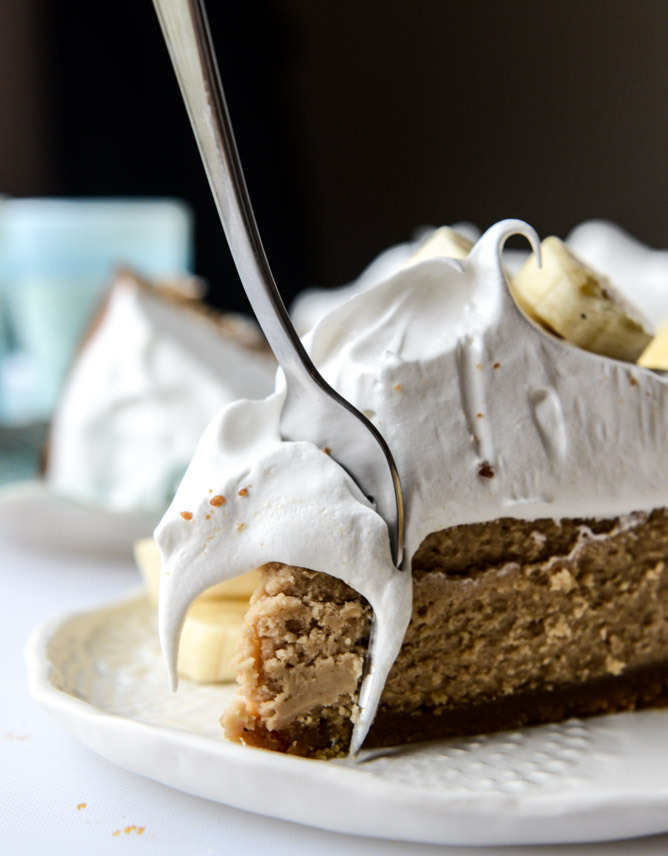 peanut butter cheesecake with whipped marshmallow and bananas.