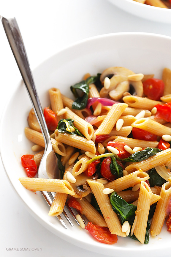 Pasta with mushrooms, tomatoes and spinach